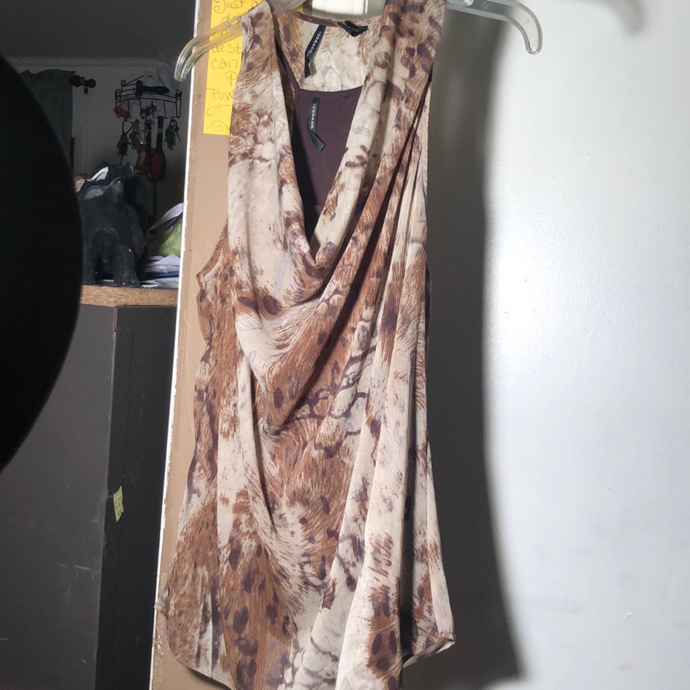 Small shear brown leopard blouse with a sewed in brown undershirt